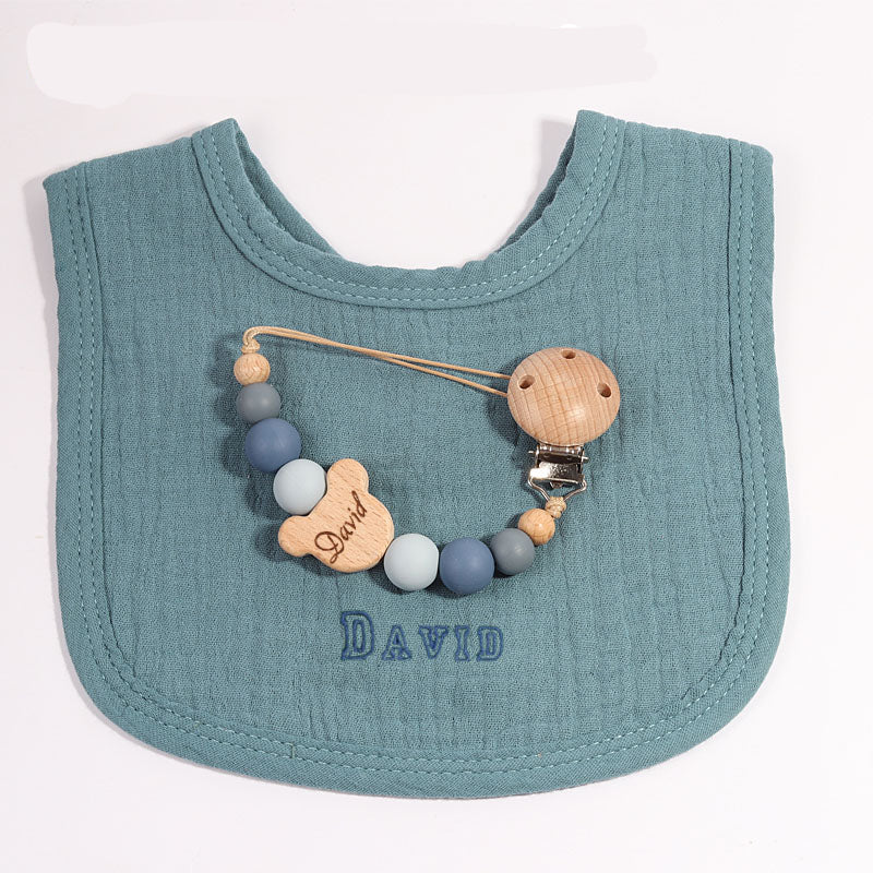Bavoir bleu petrole